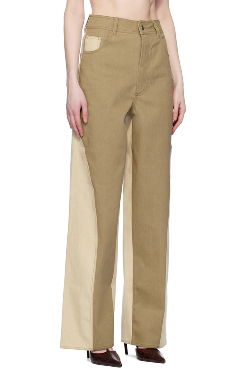 Straight-fit stretch denim jeans.

· Paneled construction
· Belt loops
· Five-pocket styling
· Zip-fly
· Twisted outseams

Supplier color: Khaki