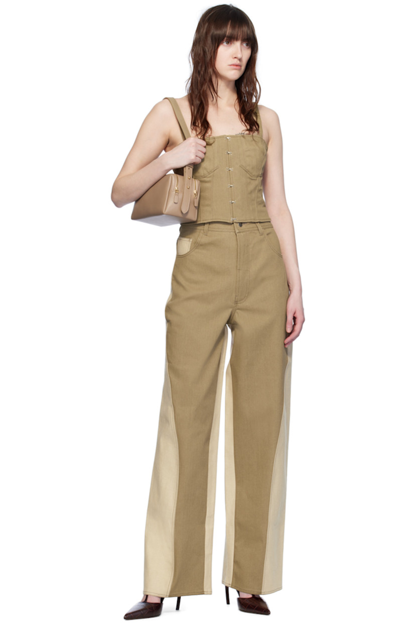 Straight-fit stretch denim jeans.

· Paneled construction
· Belt loops
· Five-pocket styling
· Zip-fly
· Twisted outseams

Supplier color: Khaki