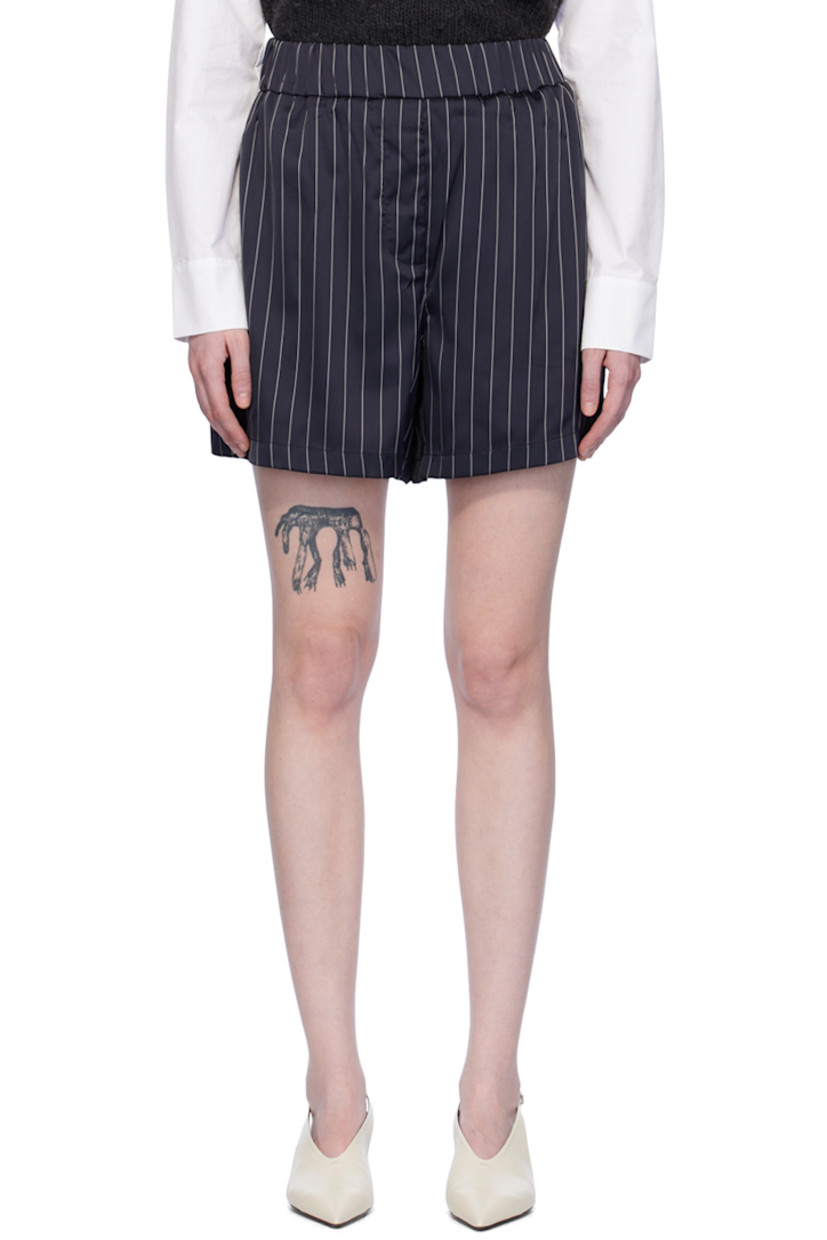 Stretch polyester satin shorts. Stripes throughout.

· Elasticized waistband
· Two-pocket styling
· Mock-fly
· Vented outseams

Supplier color: Striped navy/White