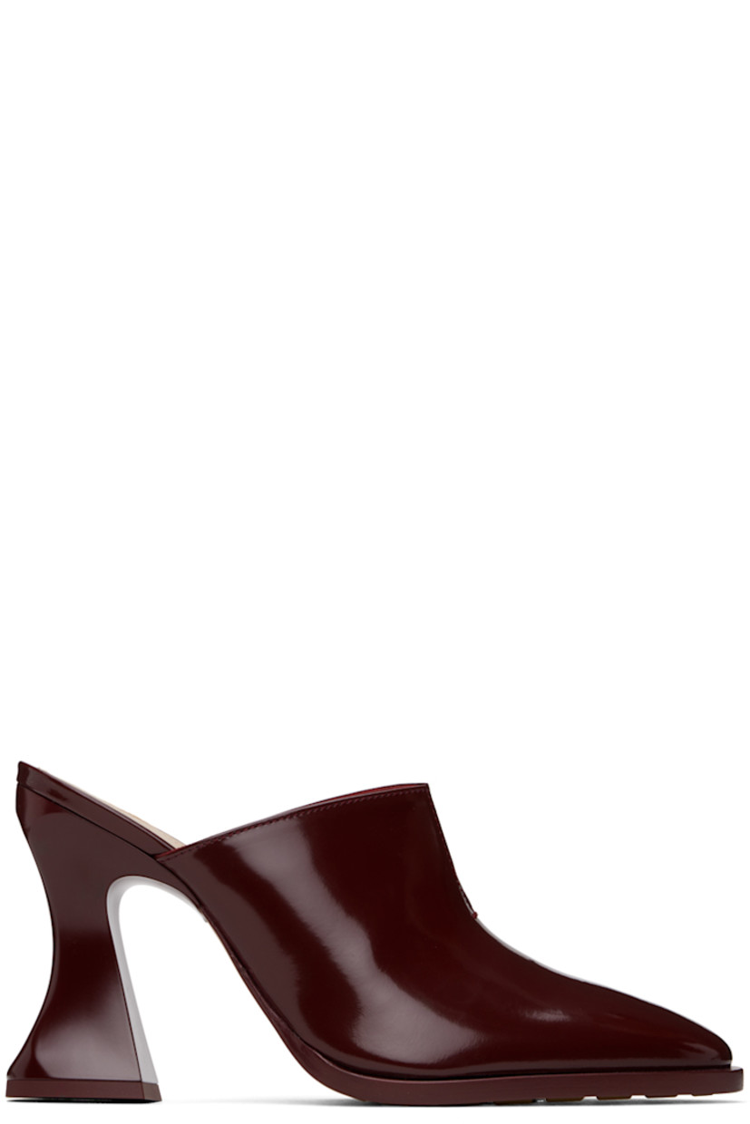 Patent calfskin slip-on heels in burgundy. 

· Pointed toe
· Slit at collar
· Logo-embossed padded lambskin footbed
· Covered spool heel with rubber injection
· Leather sole with rubber injections
· Heel: H4"

Supplier color: Merlot