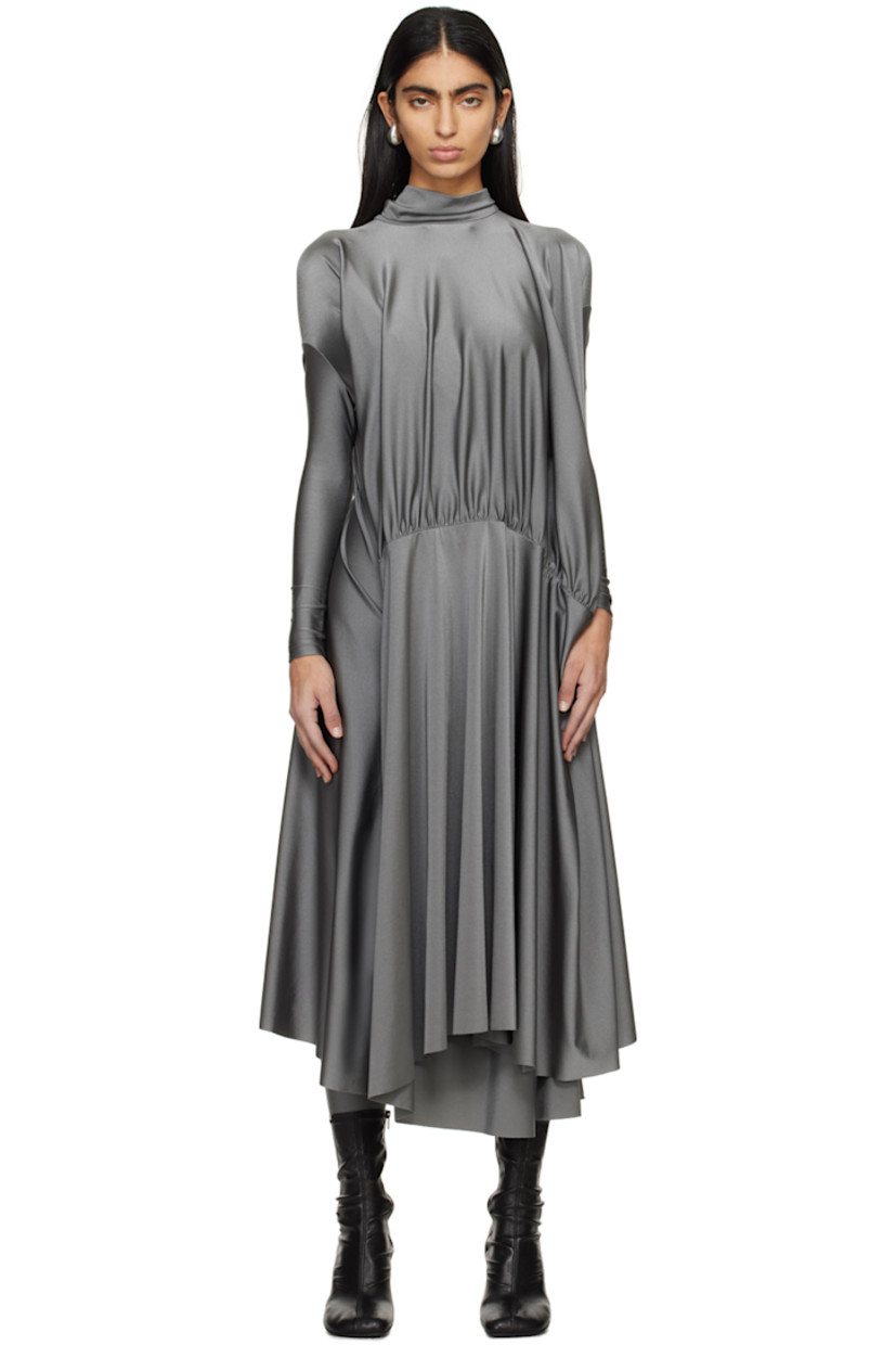 Stretch nylon lamé dress. Draping and gathering throughout.

· Self-tie fastening at turtleneck
· Dropped shoulders 
· Asymmetric hem 

Supplier color: Grey