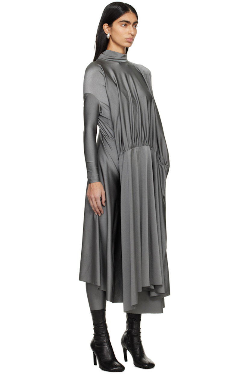 Stretch nylon lamé dress. Draping and gathering throughout.

· Self-tie fastening at turtleneck
· Dropped shoulders 
· Asymmetric hem 

Supplier color: Grey
