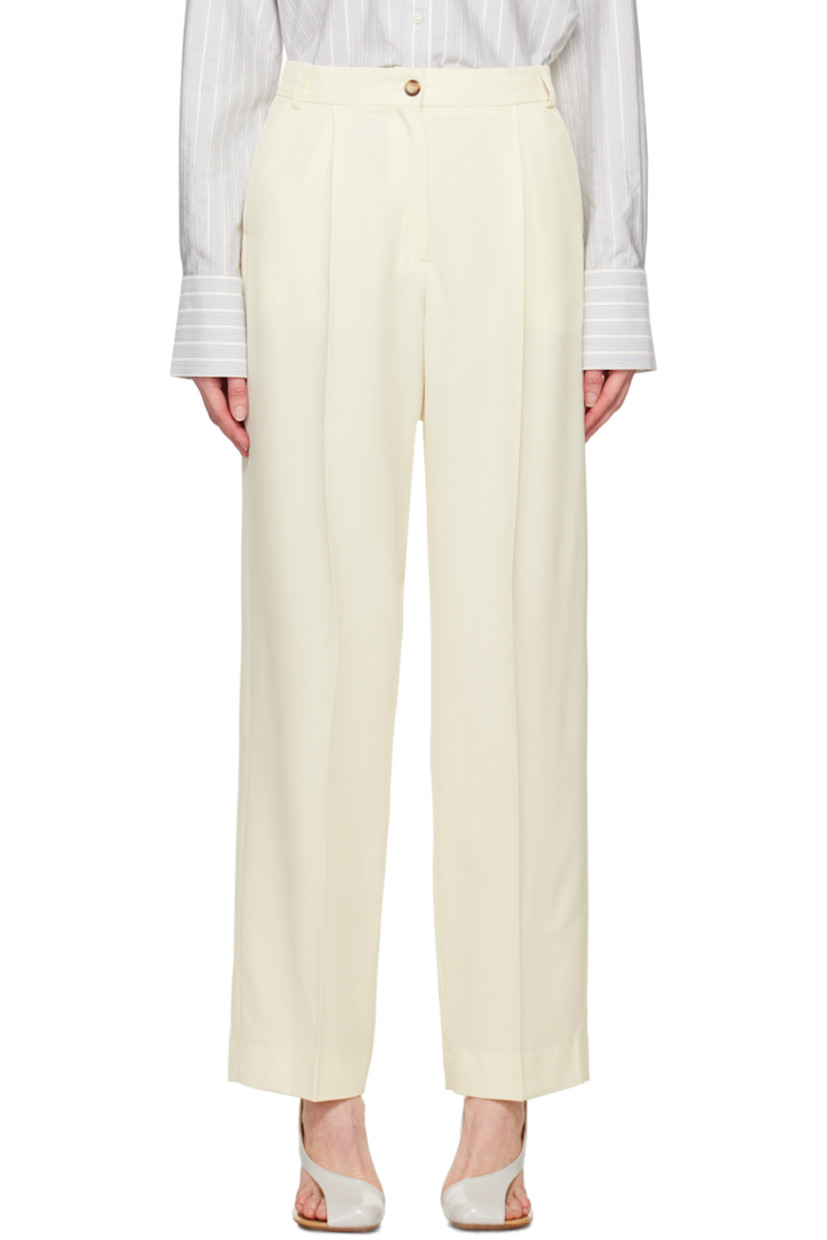 Loose-fit stretch virgin wool serge trousers.

· High-rise
· Belt loops
�· Four-pocket styling
· Zip-fly
· Pleats at front
· Creased legs

Supplier color: Off-white