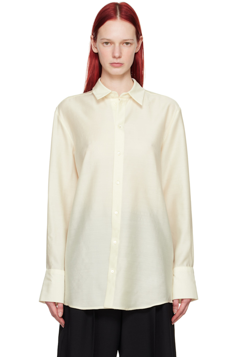 Semi-sheer virgin wool- and silk-blend twill shirt.

· Spread collar
· Button closure
· Shirttail hem
· Two-button barrel cuffs

Part of the His & Hers collection.

Supplier color: Off-white