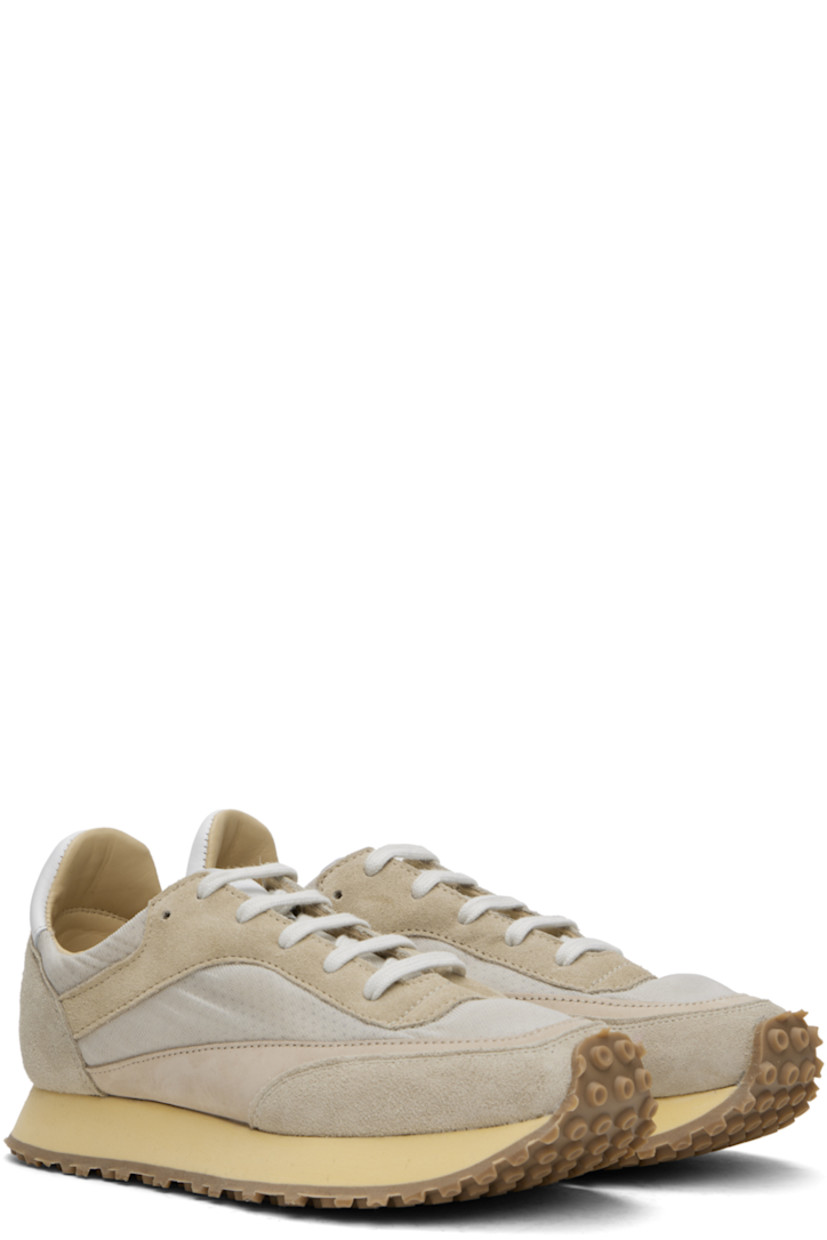 Low-top paneled suede, buffed leather, and mesh sneakers in tones of beige.

· Lace-up closure
· Logo patch at padded tongue
· Padded collar
· Buffed calfskin and mesh lining
· Stacked foam rubber midsole
· Treaded rubber sole

Supplier color: Sand
