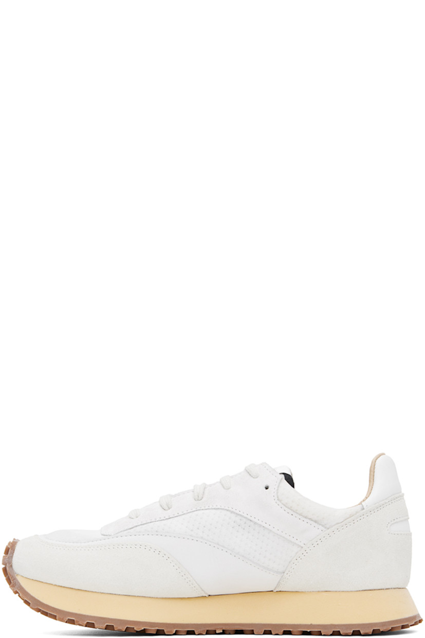 Low-top paneled suede, nubuck, and mesh sneakers in white. 

· Lace-up closure
· Logo patch at padded tongue
· Padded collar
· Logo-embossed padded leather footbed
· Buffed leather and mesh lining
· Foam rubber midsole
· Treaded rubber outsole

Supplier color: White
