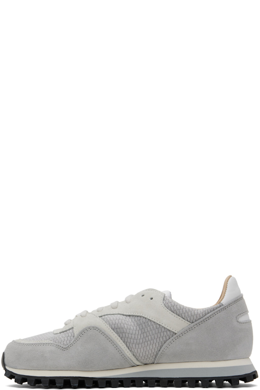 Low-top paneled mesh, suede, and buffed leather sneakers in tones of gray.

· Lace-up closure
· Logo patch at padded tongue
· Padded collar
· Buffed leather and mesh lining 
· Stacked foam rubber midsole
· Treaded rubber sole

Supplier color: Grey