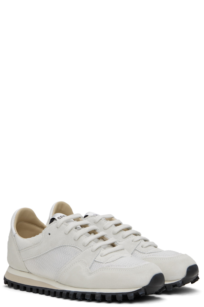 Low-top paneled mesh, suede, and buffed leather sneakers in off-white.

· Lace-up closure
· Logo patch at padded tongue
· Padded collar
· Buffed calfskin and mesh lining
· Stacked foam rubber midsole
· Treaded rubber sole

Supplier color: Off-white