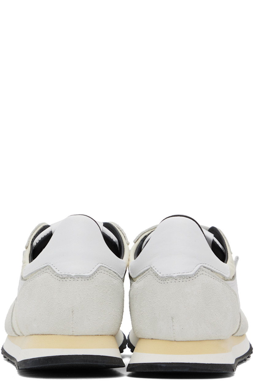 Low-top paneled ripstop, canvas, suede, and buffed leather sneakers in tones of white.

· Lace-up closure
· Logo patch at padded tongue
· Padded collar
· Text stamped at outer side
· Buffed calfskin and mesh lining
· Stacked foam rubber midsole
· Treaded rubber sole

Supplier color: White