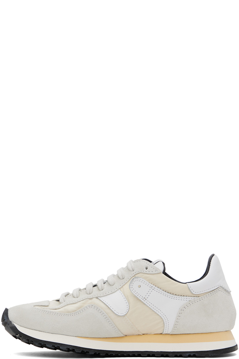 Low-top paneled ripstop, canvas, suede, and buffed leather sneakers in tones of white.

· Lace-up closure
· Logo patch at padded tongue
· Padded collar
· Text stamped at outer side
· Buffed calfskin and mesh lining
· Stacked foam rubber midsole
· Treaded rubber sole

Supplier color: White