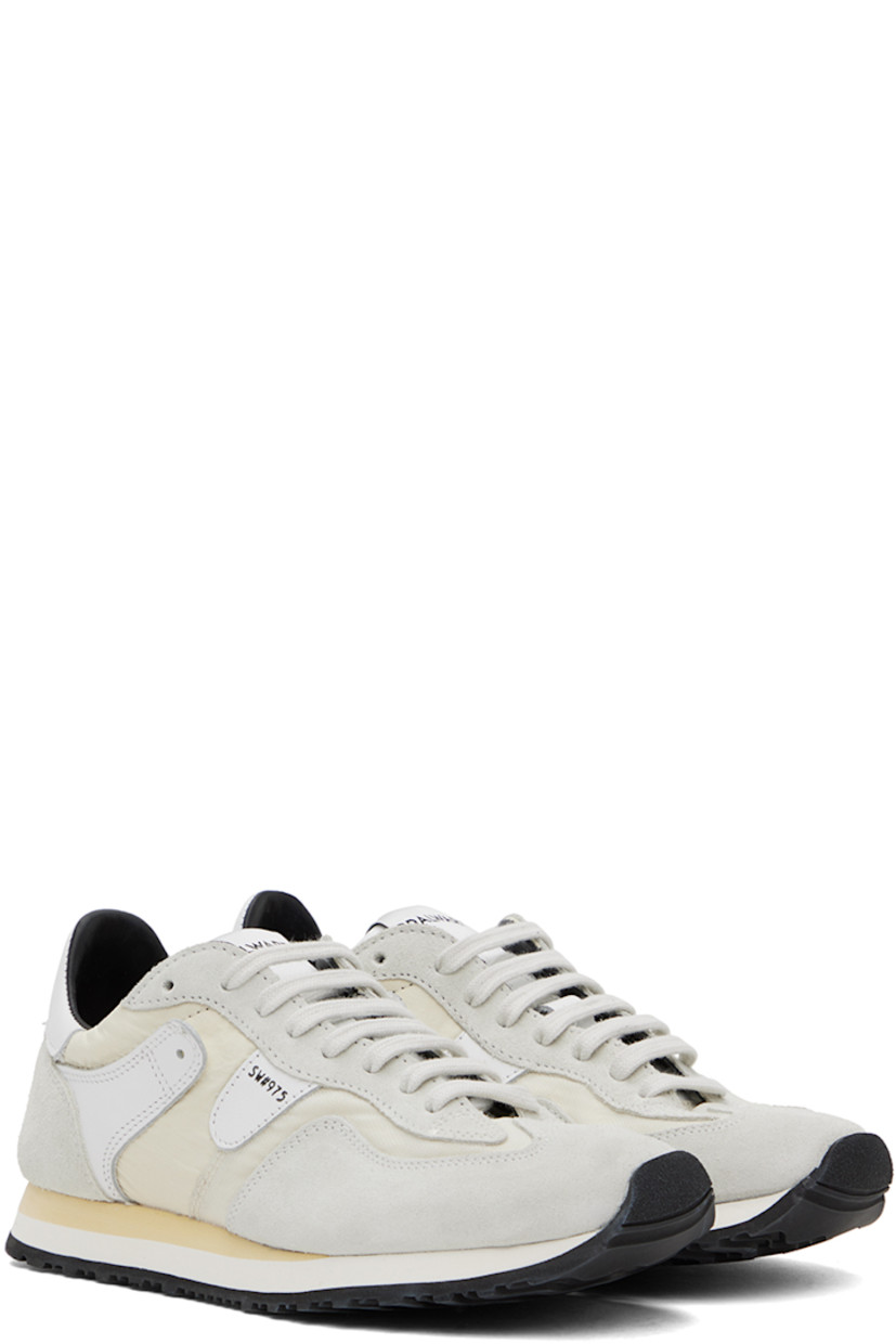 Low-top paneled ripstop, canvas, suede, and buffed leather sneakers in tones of white.

· Lace-up closure
· Logo patch at padded tongue
· Padded collar
· Text stamped at outer side
· Buffed calfskin and mesh lining
· Stacked foam rubber midsole
· Treaded rubber sole

Supplier color: White
