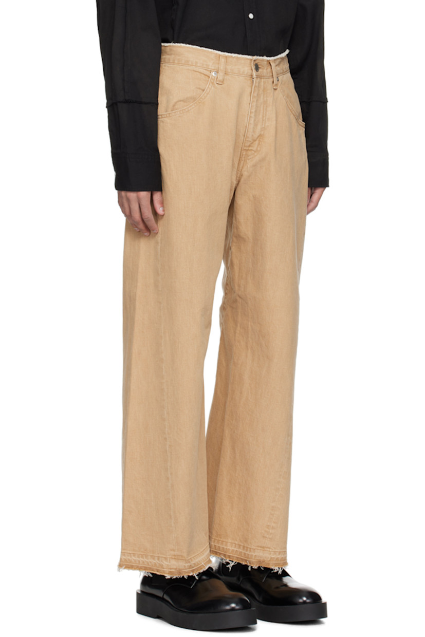 Loose-fit non-stretch denim jeans.

· Paneled construction
· Raw edge at waistband
· Belt loops
· Four-pocket styling
· Zip-fly
· Fraying at cuffs
· Leather logo patch at back waistband
· Logo flag at back pocket
· Logo-engraved silver-tone hardware

Supplier color: Beige