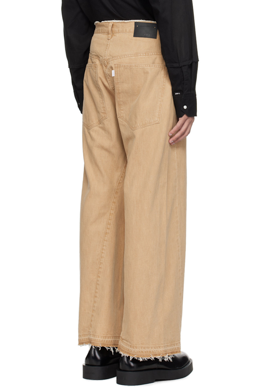 Loose-fit non-stretch denim jeans.

· Paneled construction
· Raw edge at waistband
· Belt loops
· Four-pocket styling
· Zip-fly
· Fraying at cuffs
· Leather logo patch at back waistband
· Logo flag at back pocket
· Logo-engraved silver-tone hardware

Supplier color: Beige