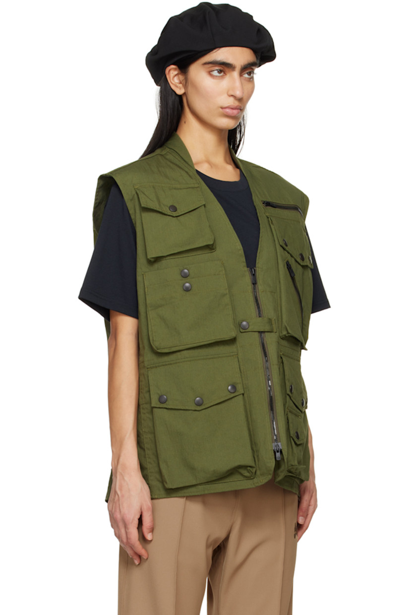 Cotton- and nylon-blend oxford cloth vest.

· Stand collar
· V-Neck
· Press-stud tab at two-way zip closure
· Zip and flap pockets
· Adjustable press-stud tabs at hem
· Flap pocket at back

Supplier color: A-olive