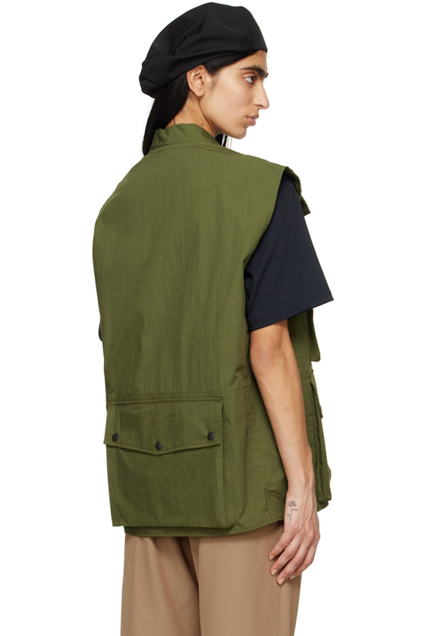 Cotton- and nylon-blend oxford cloth vest.

· Stand collar
· V-Neck
· Press-stud tab at two-way zip closure
· Zip and flap pockets
· Adjustable press-stud tabs at hem
· Flap pocket at back

Supplier color: A-olive