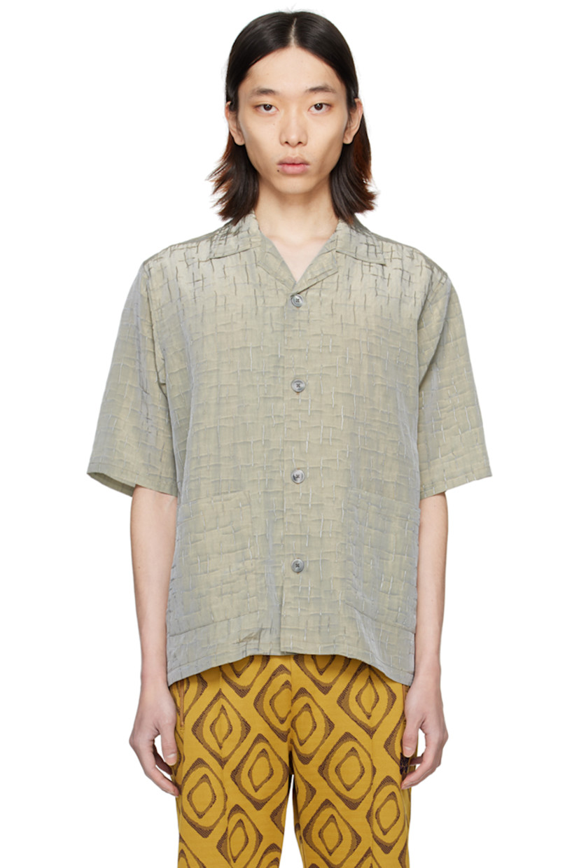 Rayon- and nylon-blend sateen shirt. Jacquard pattern embroidered throughout.

· Open spread collar
· Button closure
· Patch pockets

Supplier color: Blue/Grey