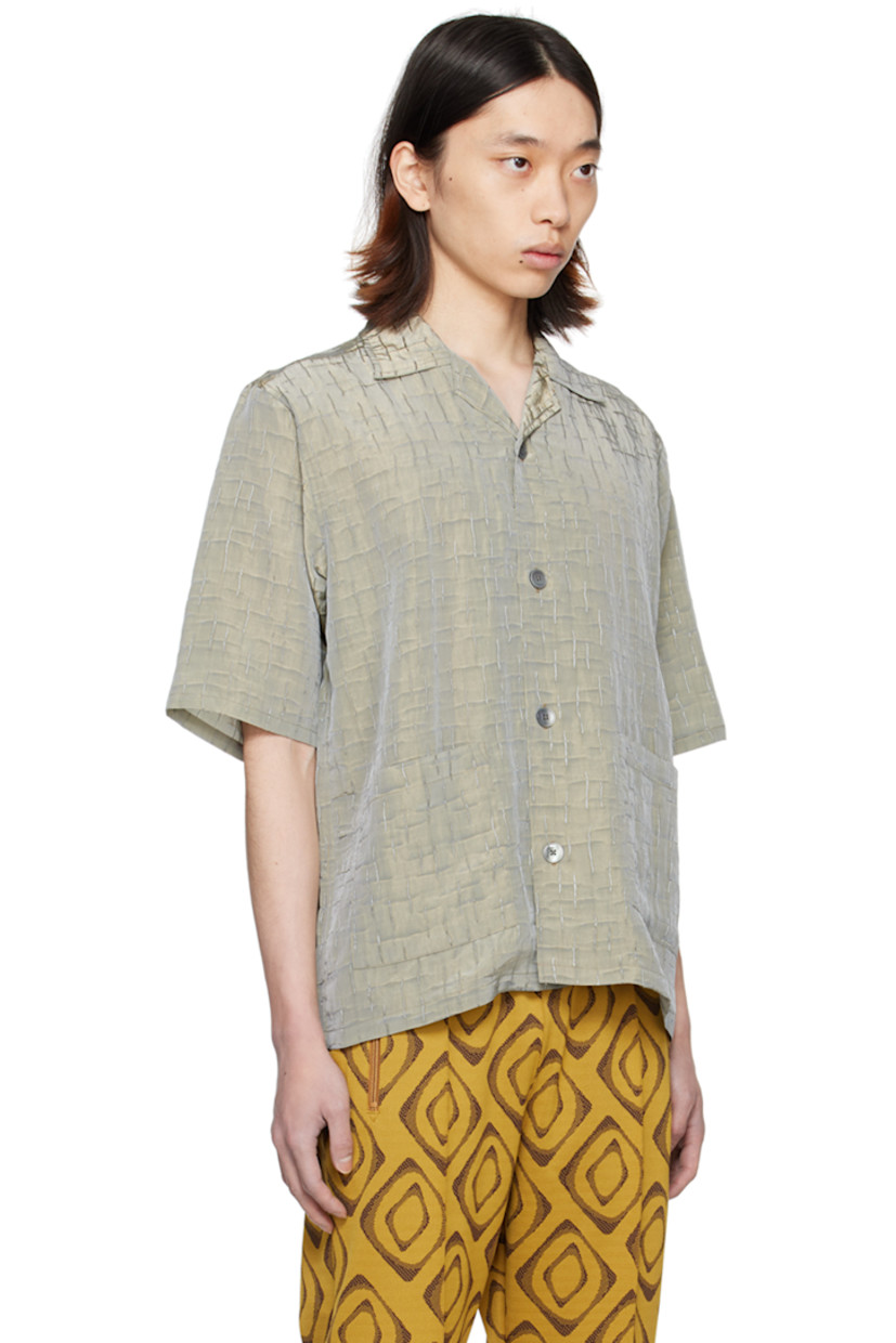 Rayon- and nylon-blend sateen shirt. Jacquard pattern embroidered throughout.

· Open spread collar
· Button closure
· Patch pockets

Supplier color: Blue/Grey