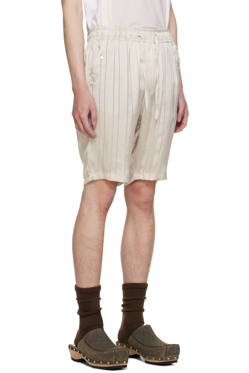 Triacetate- and cupro-blend georgette shorts. Jacquard stripes throughout.

· Drawstring at elasticized waistband
· Four-pocket styling
· Mock-fly
· Logo graphic embroidered at front

Supplier color: Beige