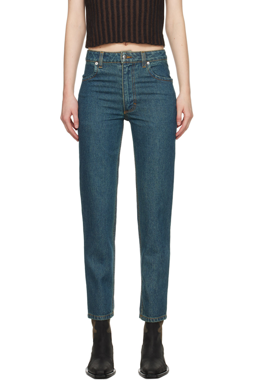 Overdyed enzyme-washed non-stretch denim jeans. Fading throughout.

· Low-rise
· Belt loops
· Four-pocket styling
· Zip-fly
· Logo-engraved silver-tone hardware 
· Contrast stitching in tan 

Supplier color: New blue