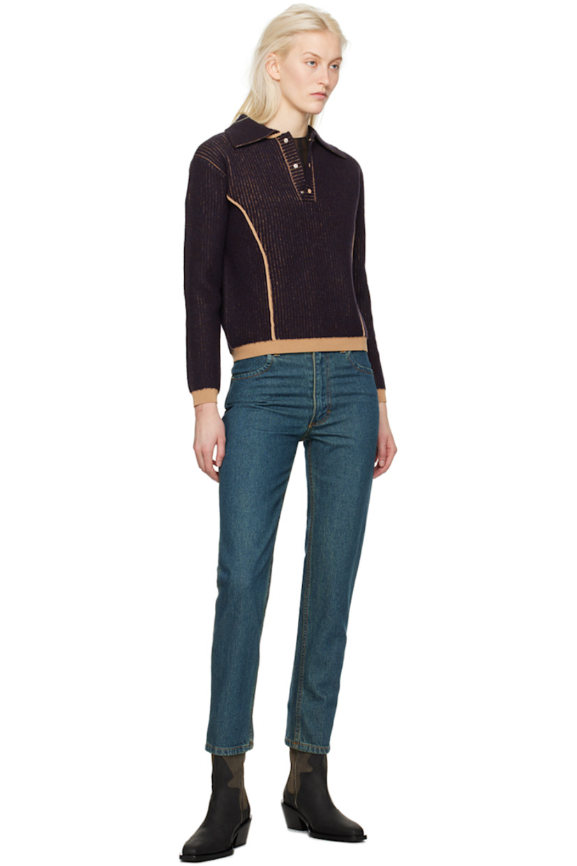 Overdyed enzyme-washed non-stretch denim jeans. Fading throughout.

· Low-rise
· Belt loops
· Four-pocket styling
· Zip-fly
· Logo-engraved silver-tone hardware 
· Contrast stitching in tan 

Supplier color: New blue