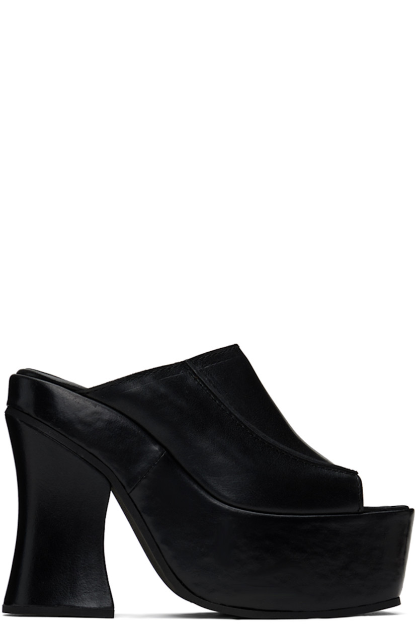 Grained leather mules in black.

· Open square toe
· Pinched seams at vamp
· Logo embossed at padded footbed
· Covered block heel 
· Platform midsole
· Foam rubber sole
· Platform: H2.25" 
· Heel: H5"

Supplier color: Black