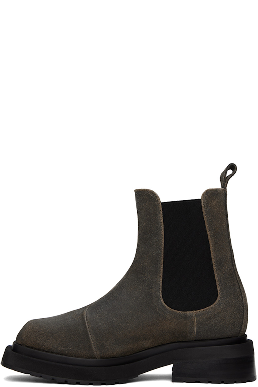Ankle-high suede Chelsea boots in gray.

· Square toe
· Pull-loop at heel collar
· Elasticized gusset at sides
· Grained leather lining 
· Rubber injection at block heel
· Treaded rubber sole
· Heel: H1.5"

Supplier color: Gray