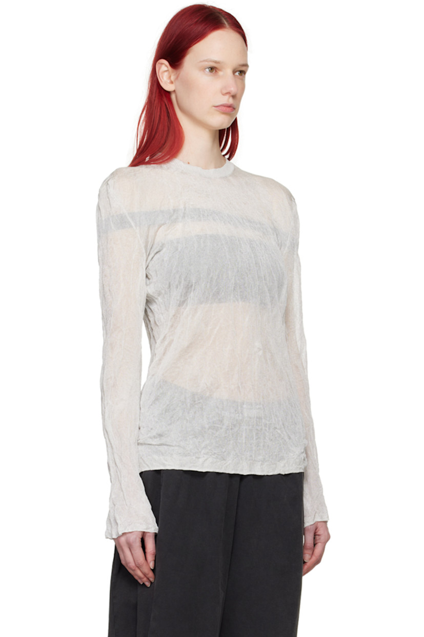 Semi-sheer ENKA- and FSC-certified crinkled knit viscose- and steel-blend T-shirt. 

· Rib knit crewneck, hem, and cuffs 
· Logo embroidered at back collar

Supplier color: White