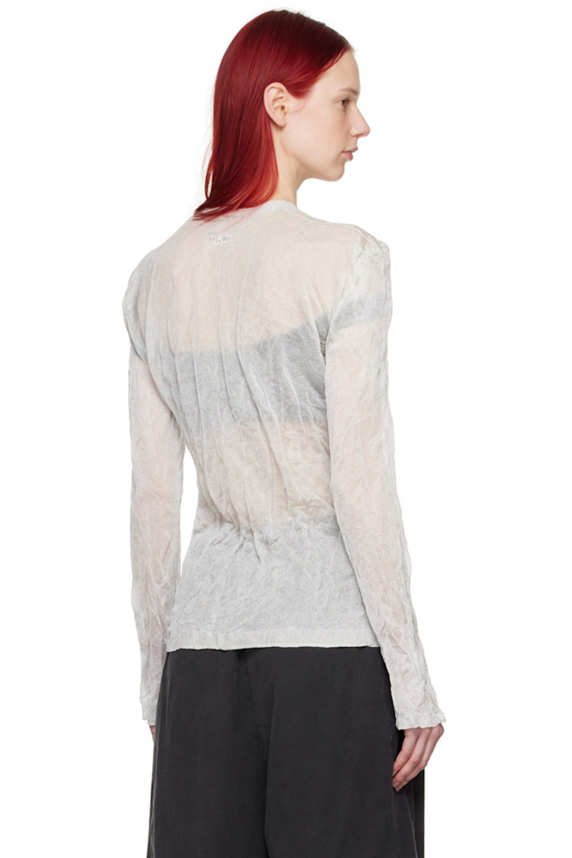 Semi-sheer ENKA- and FSC-certified crinkled knit viscose- and steel-blend T-shirt. 

· Rib knit crewneck, hem, and cuffs 
· Logo embroidered at back collar

Supplier color: White