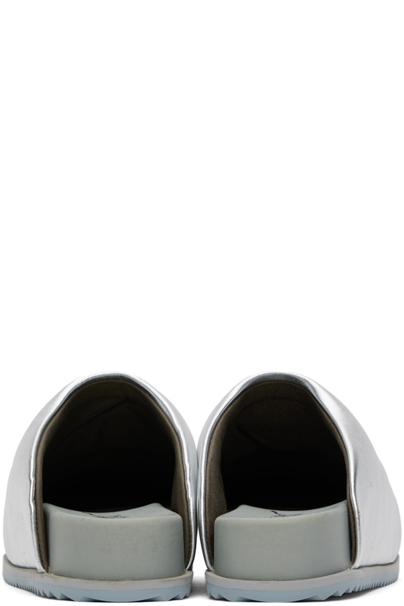 Faux-leather slip-on loafers in metallic silver tone.

· Square toe
· Logo stamp at molded footbed
· Treaded TPU sole

Supplier color: Silver