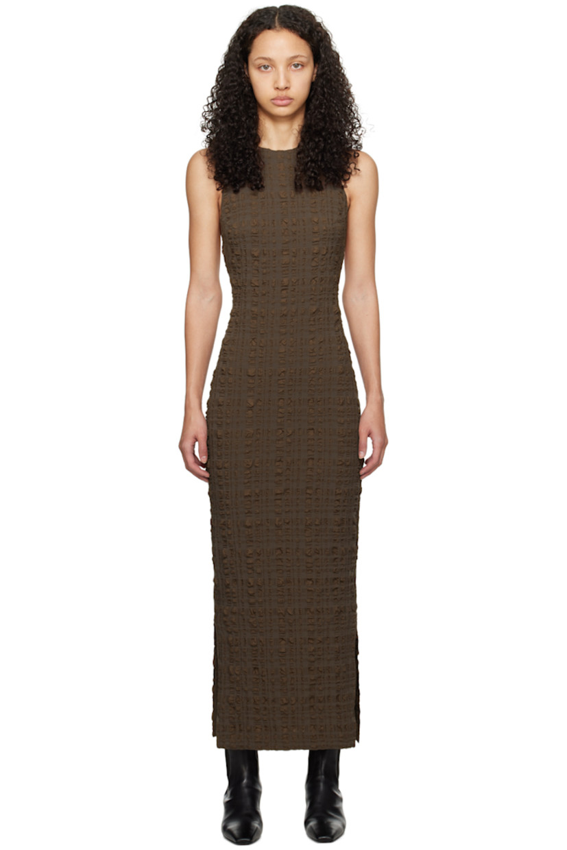 Stretch polyester- and nylon-blend seersucker dress.

· Crewneck
· Slit at side seams
�· Button fastening at shoulder
· Open back
· Unlined

Supplier color: Dark brown