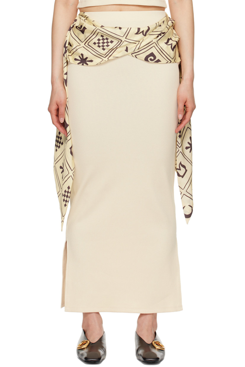 Organic cotton ribbed jersey skirt. Graphic pattern printed at integrated silk twill scarf-style overlay.

· Elasticized waistband
· Draping at overlay
· Vented side seams

Supplier color: Creme
