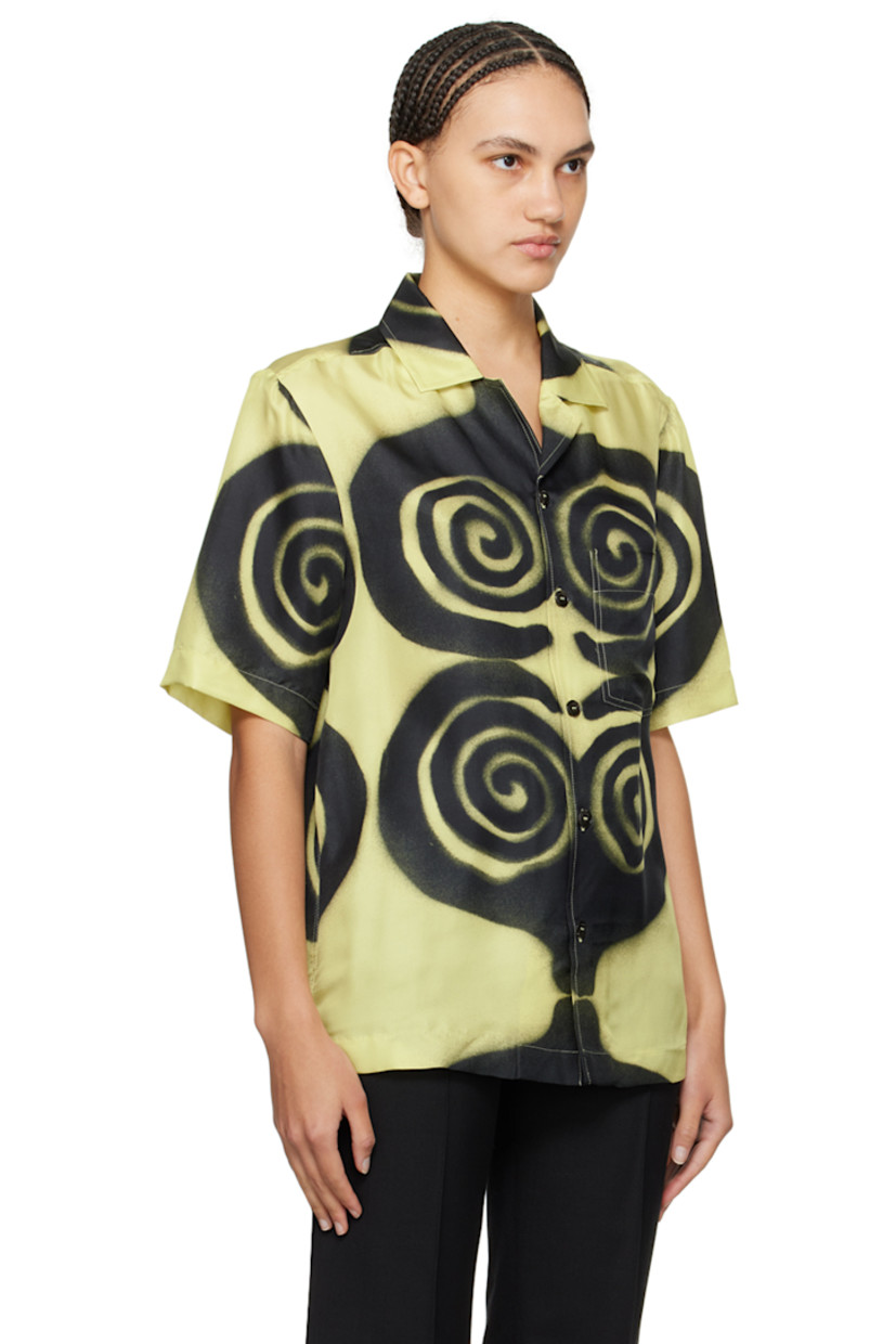 Silk twill shirt. Graphic pattern printed throughout.  

· Open spread collar
· Button closure
· Patch pocket

Supplier color: Spiral spray