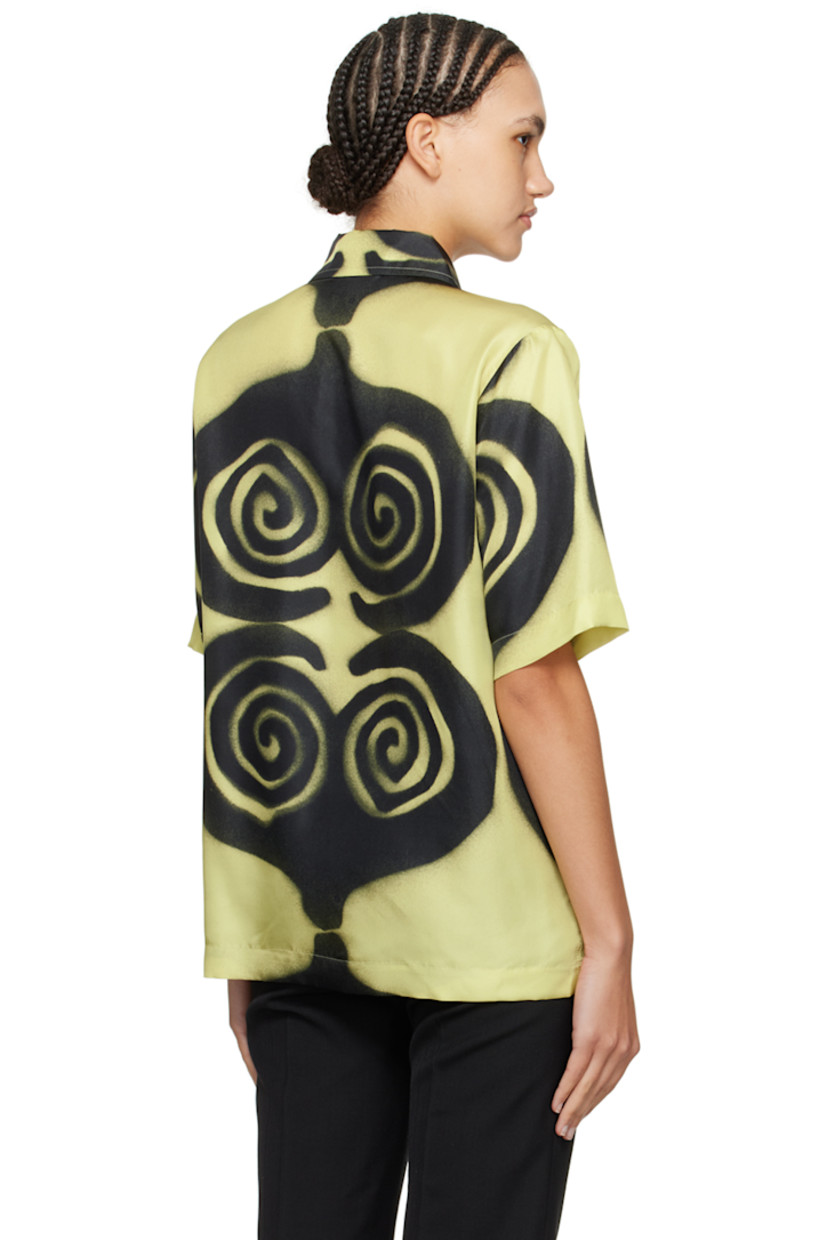 Silk twill shirt. Graphic pattern printed throughout.  

· Open spread collar
· Button closure
· Patch pocket

Supplier color: Spiral spray