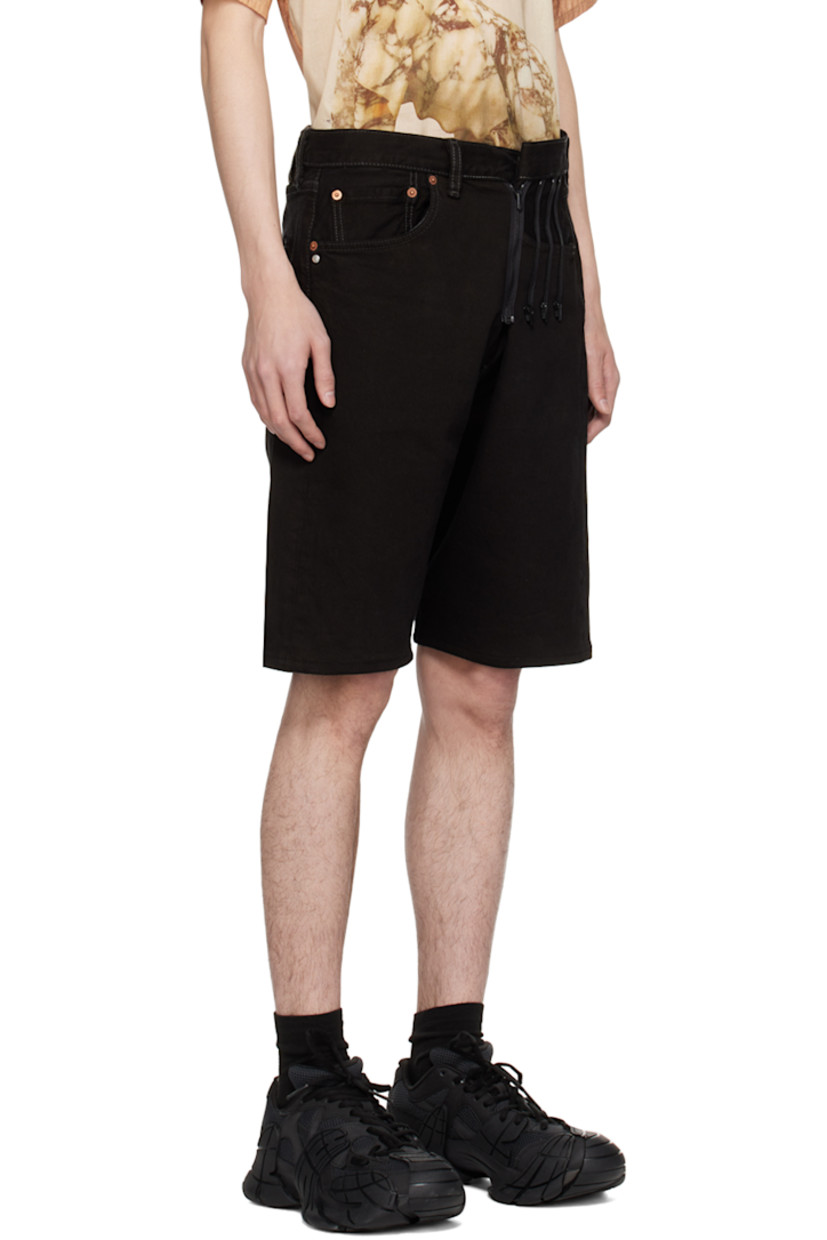Upcycled non-stretch denim shorts. Fading throughout.

· Belt loops
· Five-pocket styling
· Button-fly
· Zip detailing and logo hardware at front
· Leather logo patch at back waistband
· Logo-engraved silver-tone hardware
· Contrast stitching in gray

Supplier color: Black