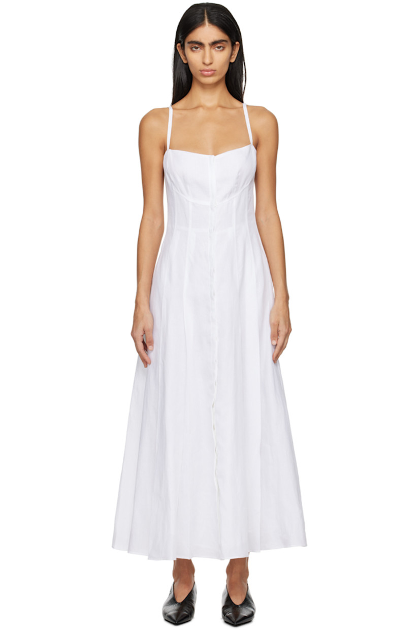 Plain-woven linen dress. 

· Sweetheart neck 
· Button closure 
· Pleated hem 
· Fixed shoulder straps 
· Full plain-woven cotton- and silk-blend lining 

Supplier color: White