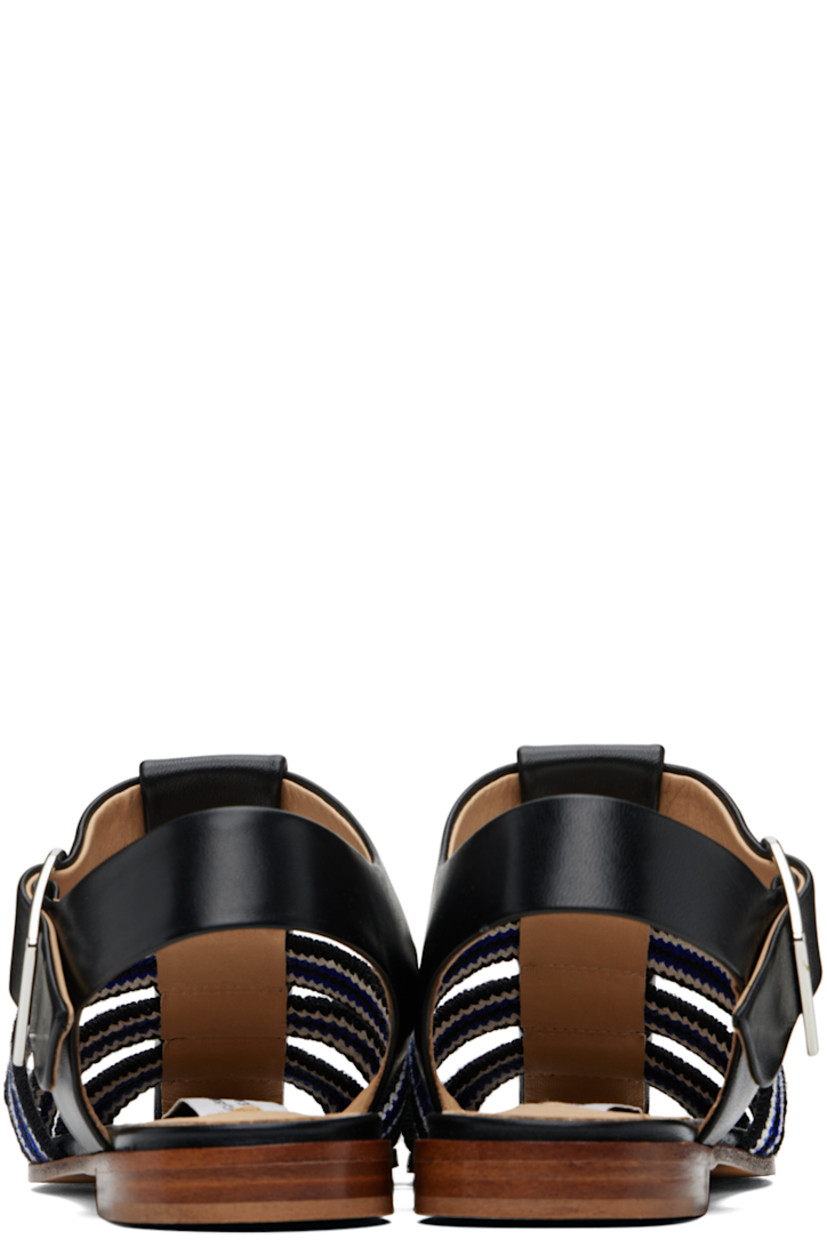 Crochet cotton and grained lambskin flat sandals in black and blue.

· Square toe 
· Stripes at vamp
· Pin-buckle ankle strap
· Grained calfskin lining
· Stacked calfskin sole with rubber injection

Supplier color: Black/Ivory/Sapphire