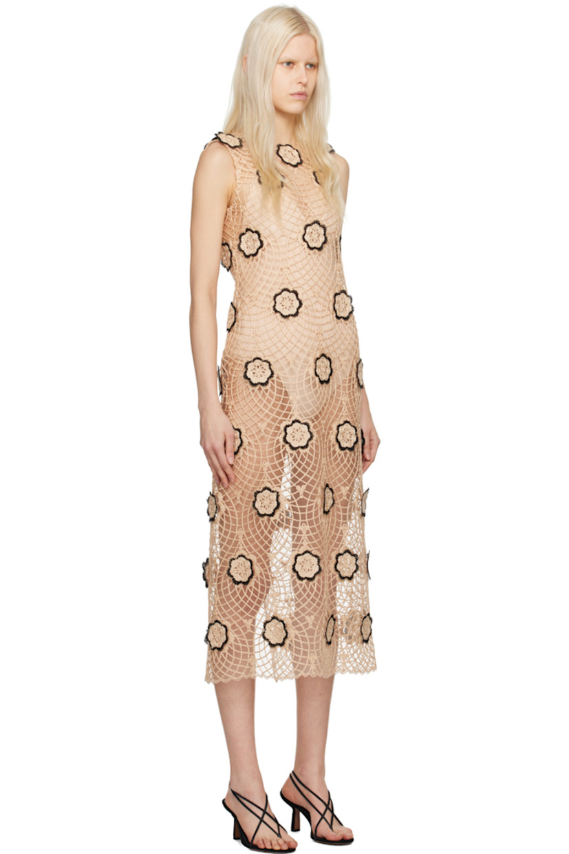 Sheer nylon-blend tulle and braided cotton jute dress. Floral appliqués throughout. 

· Round neck
· Zip closure at back
· Slit at back hem

Supplier color: Natural/Black