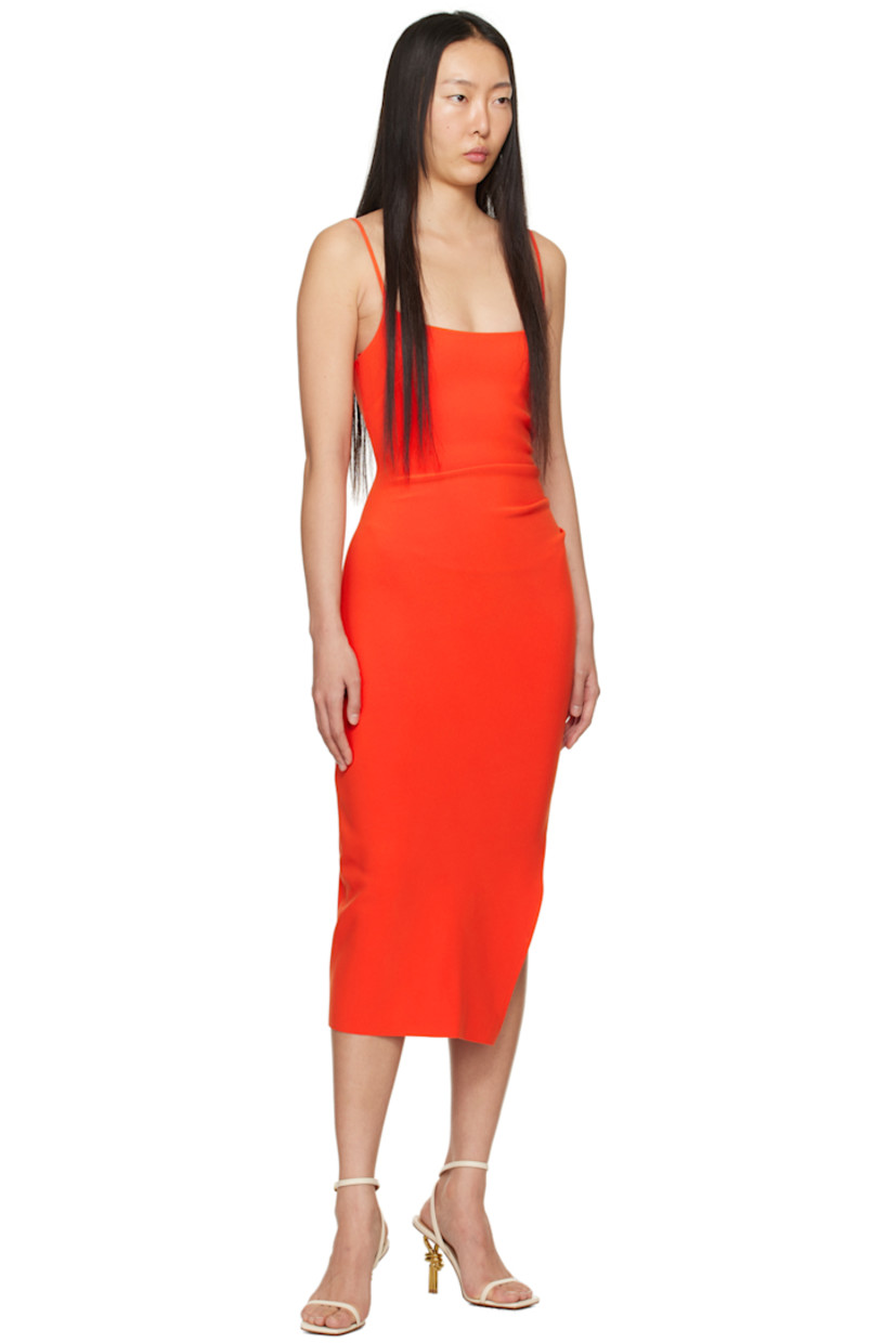 Stretch polyester crepe dress.

· Scoop neck
· Darts at chest
· Ruching at side seams
· Vented side seam
· Fixed spaghetti straps
· Partial jersey lining

Supplier color: Fire