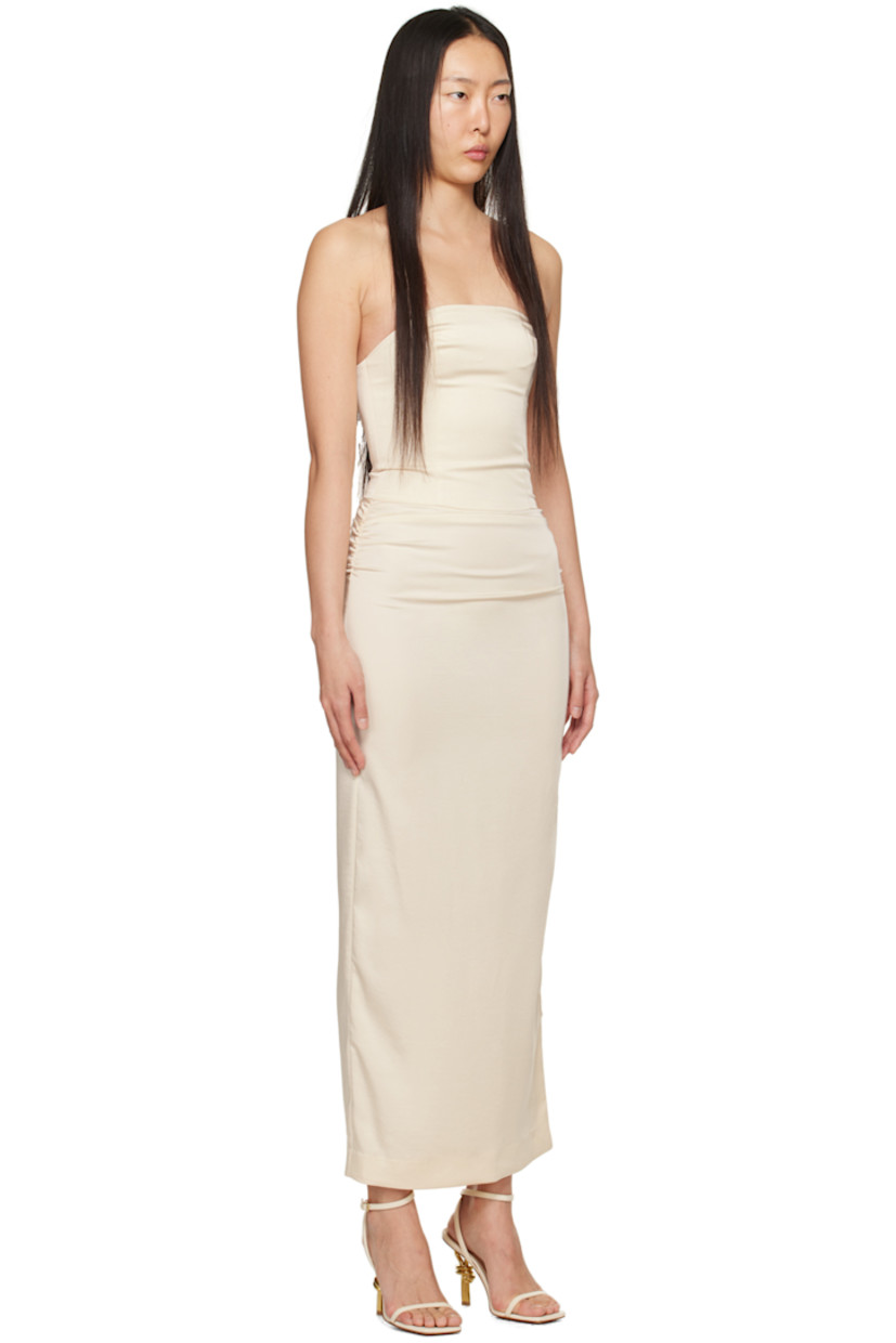 Crinkled recycled polyester-blend satin dress. Boning and darts throughout.

· Straight neck
· Ruching at side seams
· Zip closure at vented side seam
· Full twill lining

Supplier color: Vanilla bean