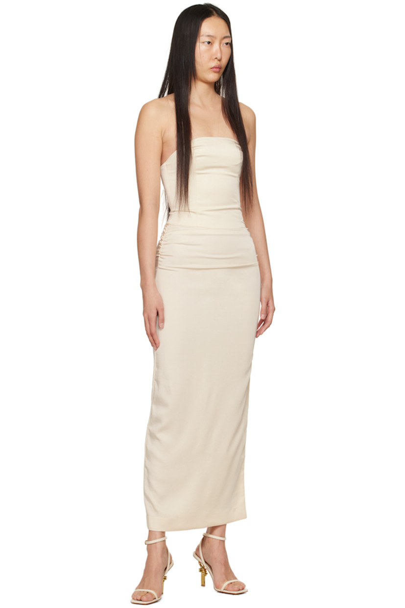 Crinkled recycled polyester-blend satin dress. Boning and darts throughout.

· Straight neck
· Ruching at side seams
· Zip closure at vented side seam
· Full twill lining

Supplier color: Vanilla bean