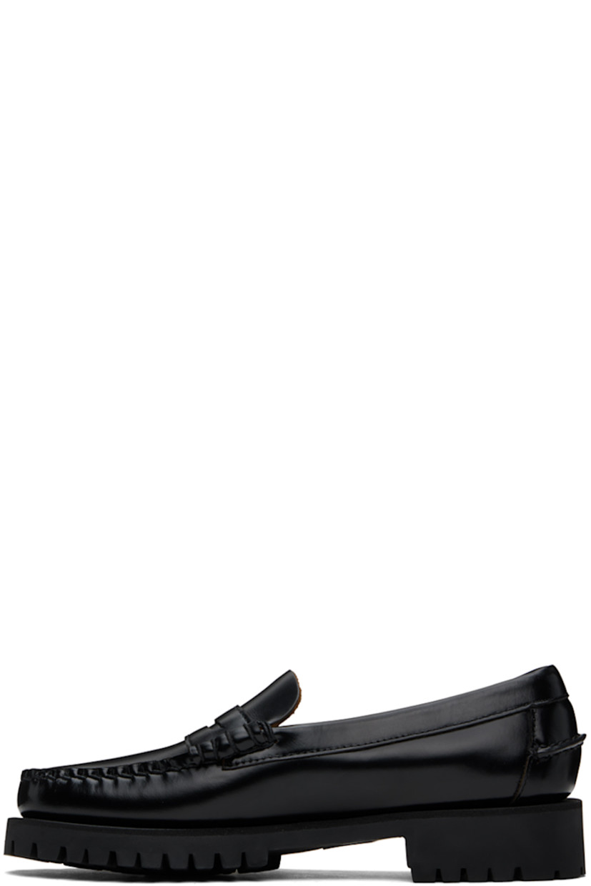 Handcrafted polished leather loafers in black.

· Moc toe
· Strap with cutout at vamp
· Suede lining
· Molded leather footbed
· Treaded rubber sole
· Heel: H1"

Part of the Citysides collection. 

Supplier color: Black