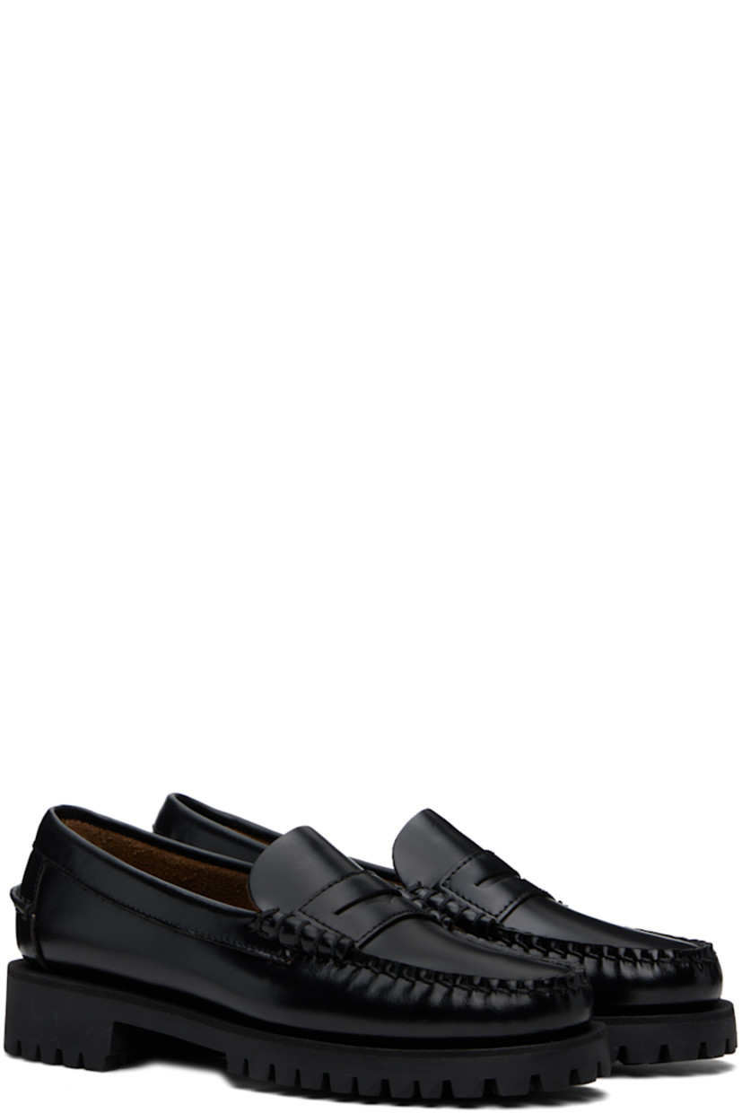 Handcrafted polished leather loafers in black.

· Moc toe
· Strap with cutout at vamp
· Suede lining
· Molded leather footbed
· Treaded rubber sole
· Heel: H1"

Part of the Citysides collection. 

Supplier color: Black