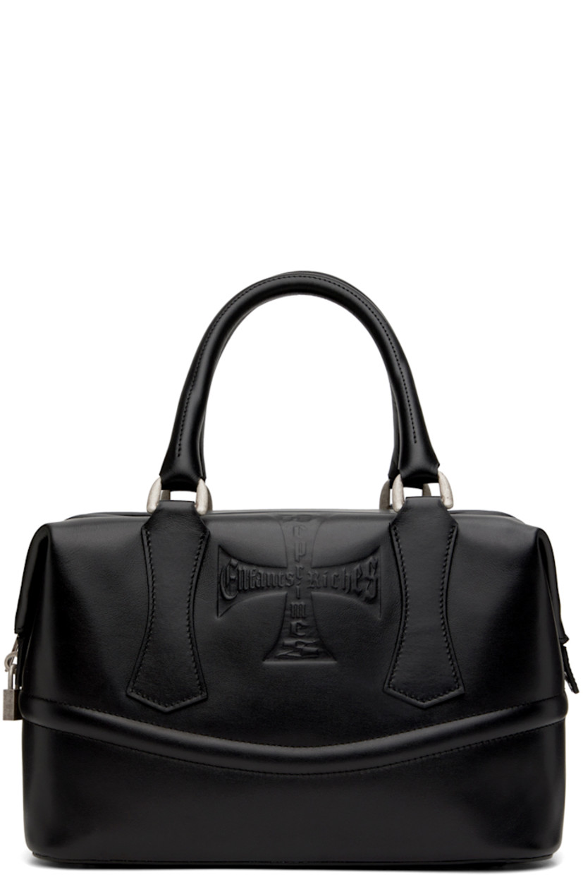 Grained calfskin duffle bag in black. 

· Twin rolled carry handles
· Logo embossed at face
· Bumper studs at base
· Logo-engraved padlock-style hardware at side
· Zip closure
· Zip and patch pockets at interior
· Removable structured compartment at interior
· Full suede lining
· H8" x W12" x 7.5"

Supplier color: Black