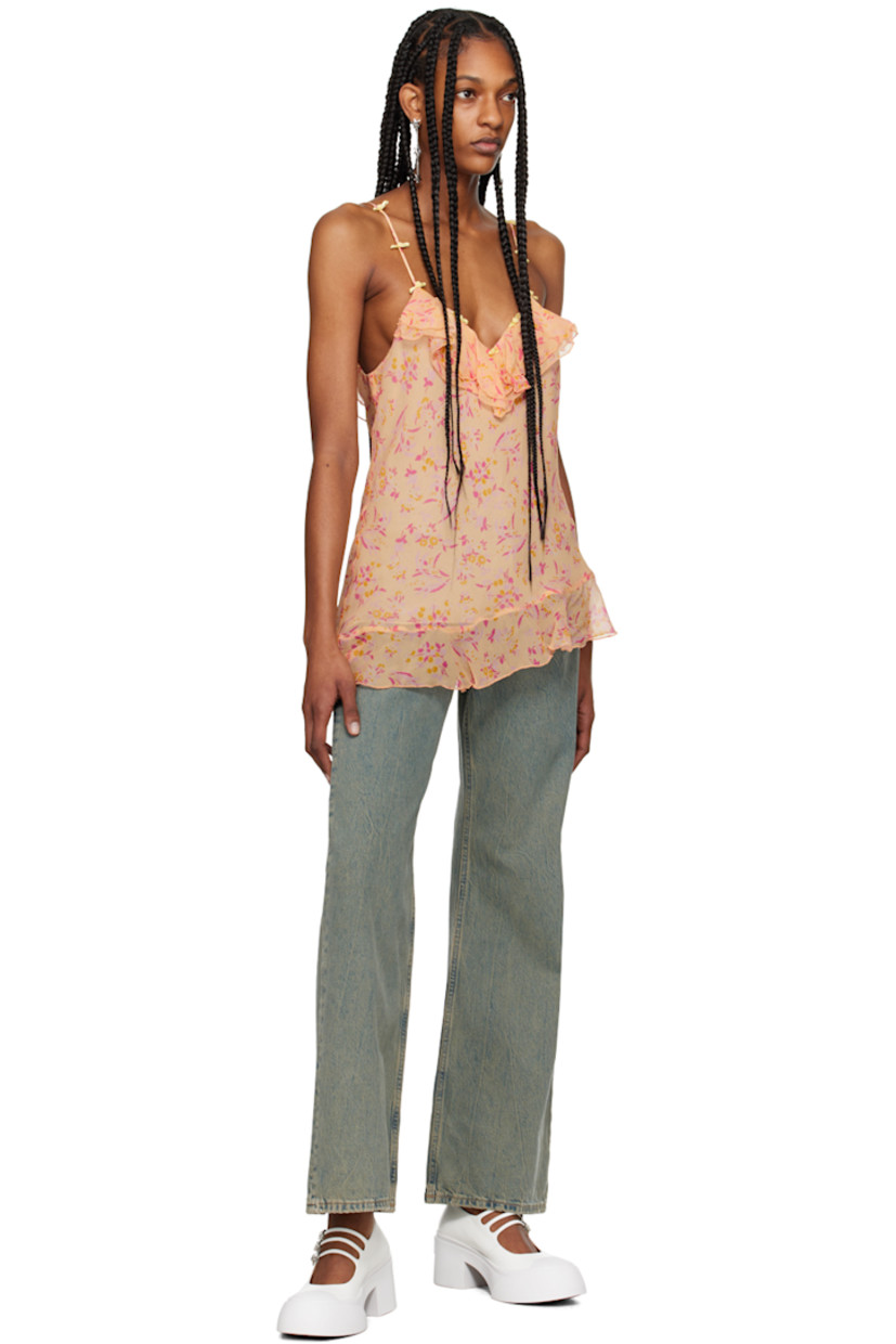 Silk crepon tank top. Floral bow appliqués, ruffled trim, floral pattern printed throughout.

· Plunging sweetheart neck
· Asymmetric hem
· Adjustable spaghetti straps
· Full polyester chiffon lining

Supplier color: Cantaloupe multi