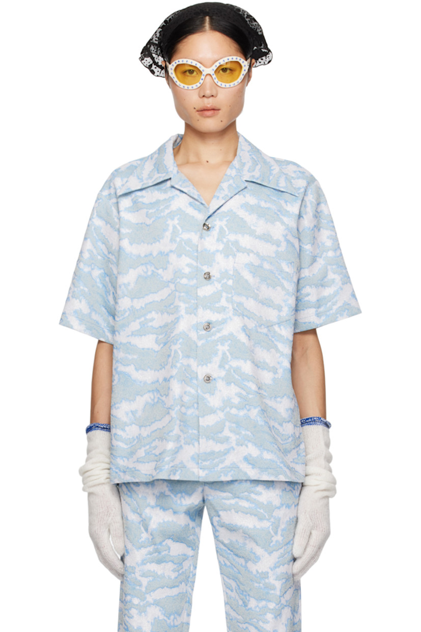 Stretch cotton-blend gobelin shirt. Metallic thread detailing and jacquard graphic pattern throughout.

· Open spread collar
· Button closure
· Patch pocket at chest

Available exclusively at SSENSE.

Supplier color: Powder blue