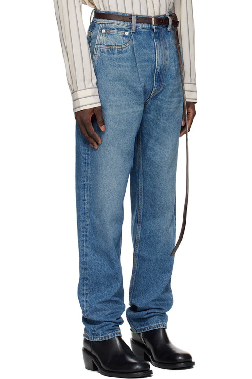 Heavyweight non-stretch denim jeans. Fading and whiskering throughout.

· Belt loops
· Five-pocket styling
· Zip-fly
· Pleats at front
· Jacron logo patch at back waistband
· Contrast stitching in orange

Supplier color: Open blue