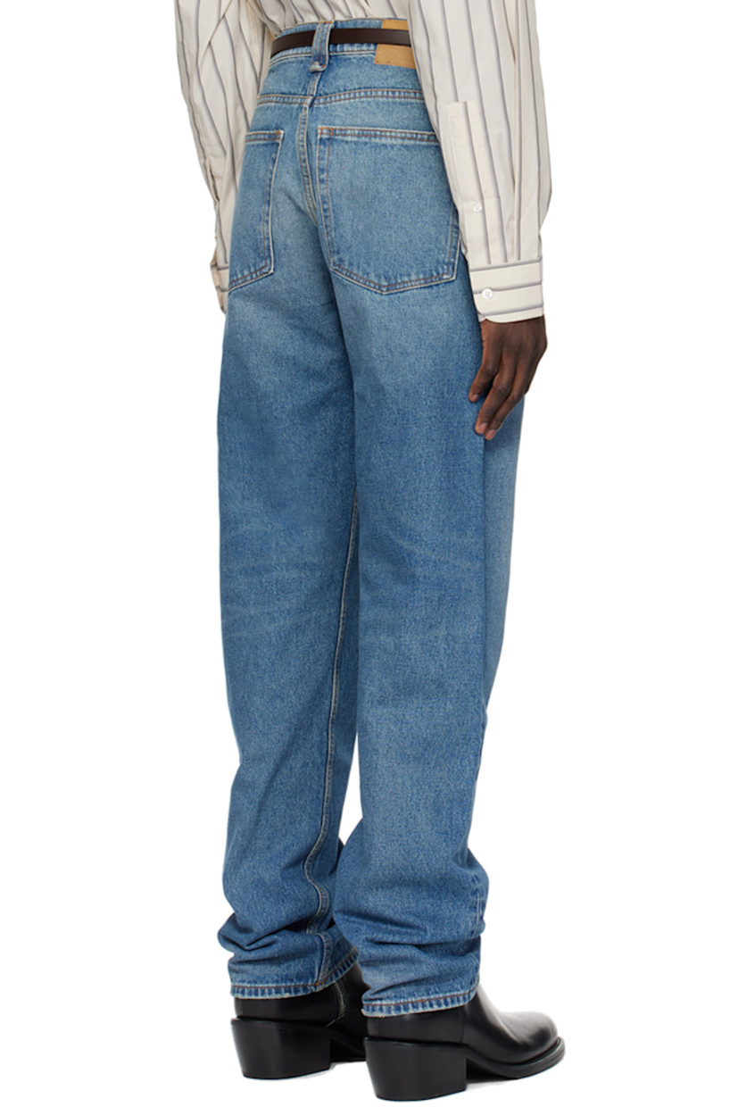 Heavyweight non-stretch denim jeans. Fading and whiskering throughout.

· Belt loops
· Five-pocket styling
· Zip-fly
· Pleats at front
· Jacron logo patch at back waistband
· Contrast stitching in orange

Supplier color: Open blue