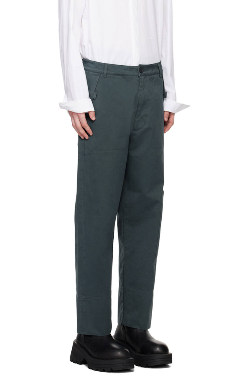 Cotton twill cargo pants. 

· Belt loops
· Four-pocket styling
· Zip-fly
· Rubberized logo patch at front 
· Patch pocket and logo patch at outseam 

Supplier color: Slate
