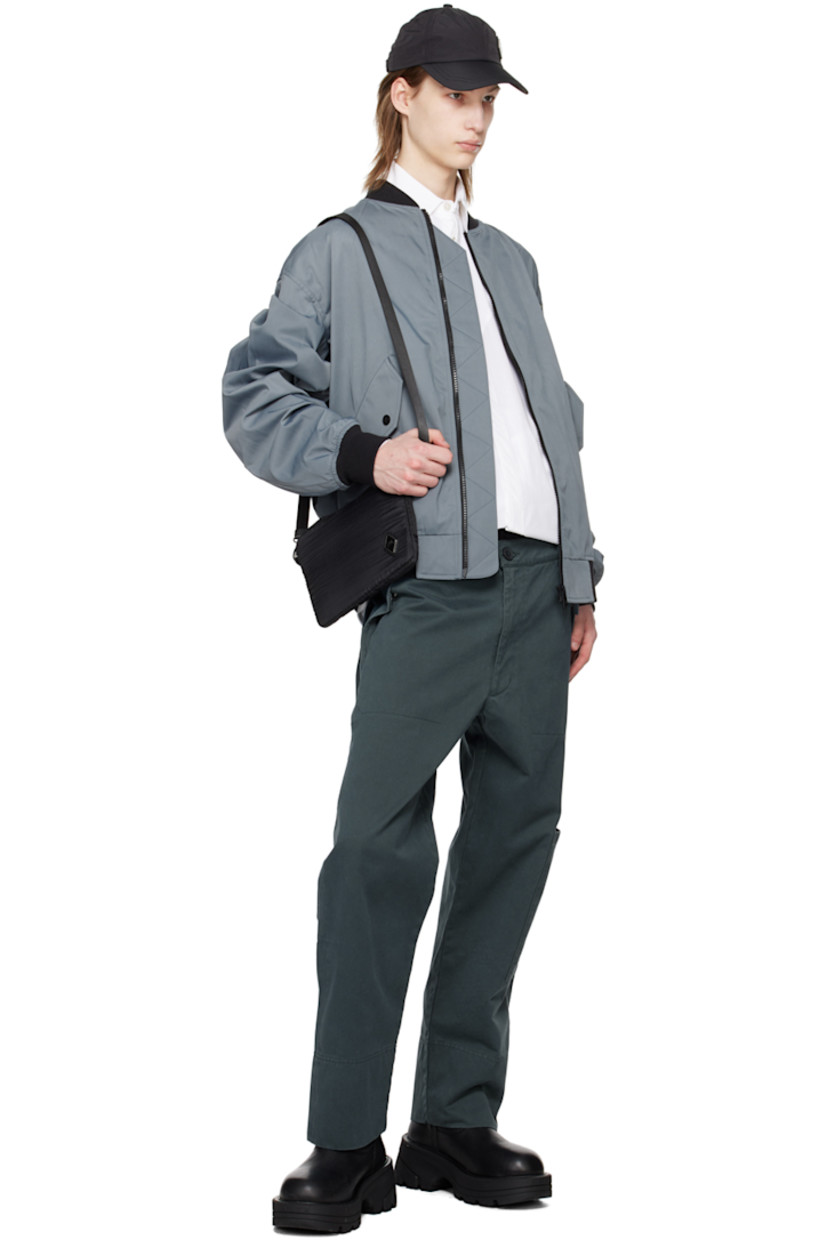 Cotton twill cargo pants. 

· Belt loops
· Four-pocket styling
· Zip-fly
· Rubberized logo patch at front 
· Patch pocket and logo patch at outseam 

Supplier color: Slate