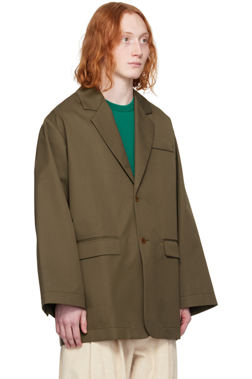 Water-repellent recycled polyester- and cotton-blend gabardine blazer.

· Notched lapel
· Two-button closure
· Welt pocket and flap pockets
· Dropped shoulders
· Three-button surgeon's cuffs
· Central vent at back hem
· Unlined

Supplier color: Khaki